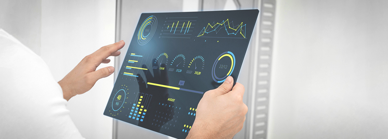 a person holding a tablet that has a dashboard open